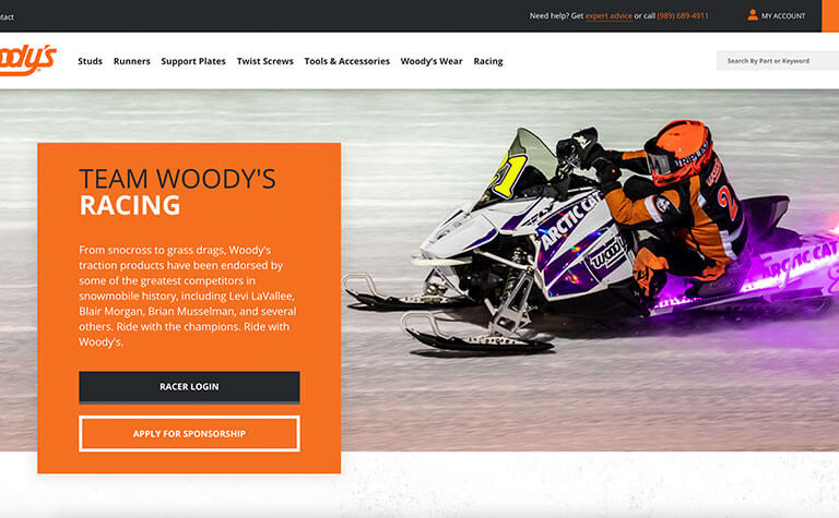 Team Woody's Website Featuring a white Snowmobile with purple lights